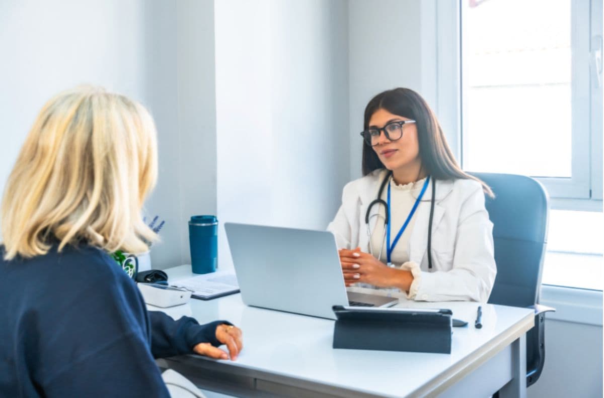 a woman consulting with her doctor about getting peptides