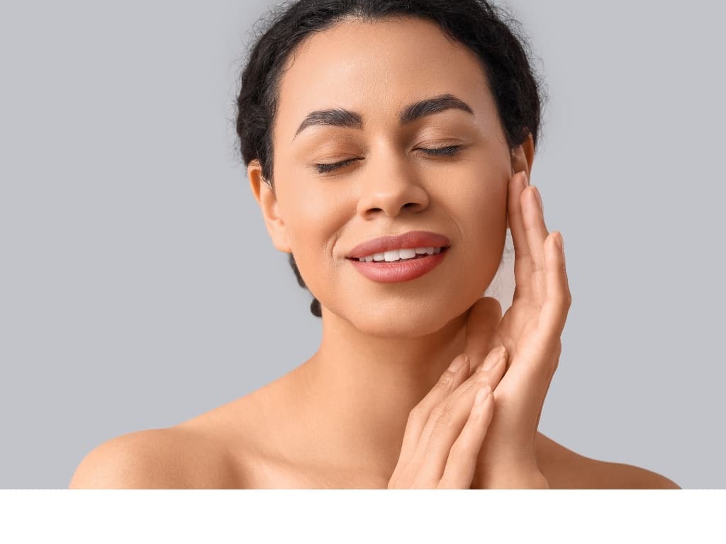 Woman touching her healthy skin