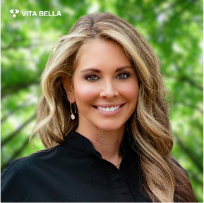 Dr. Brooke Bumetti in a close up portrait photo smiling with long hair